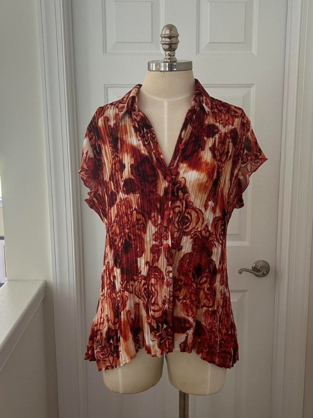 Essentials by Milano red and white floral button up blouse with pleated front.